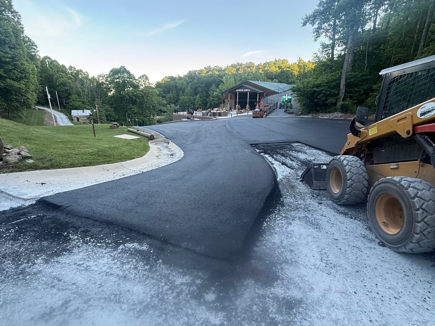 Fresh pavement leading toward Banker Lodge at Thomas Road Outpost
